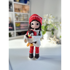 Handmade doll with penguin