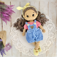 Handmade doll with hand knitted clothes