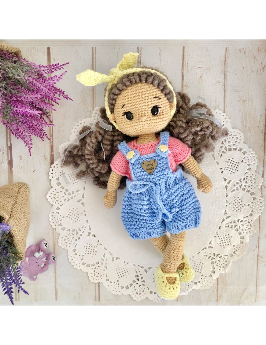 Handmade doll with hand knitted clothes