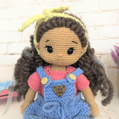 Handmade doll with hand knitted clothes