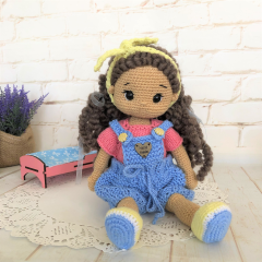 Handmade doll with hand knitted clothes