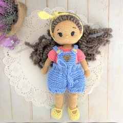 Handmade doll with hand knitted clothes