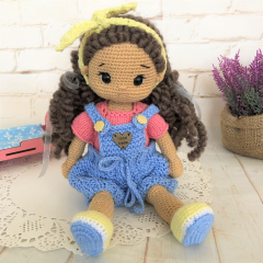 Handmade doll with hand knitted clothes