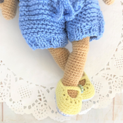 Handmade doll with hand knitted clothes