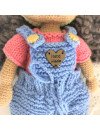 Handmade doll with hand knitted clothes