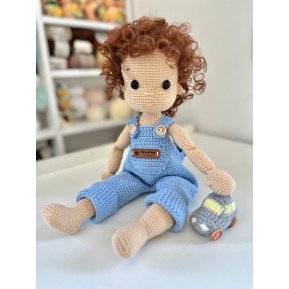 Crochet boy doll with car