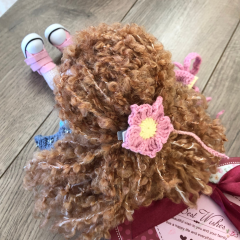 Stuffed Crochet Doll with Bendable Limbs and Curly Hair